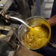 More than 50 people got sick after taking products falsely advertised to be made of CBD oil. The real stuff is seen being processed from hemp above.